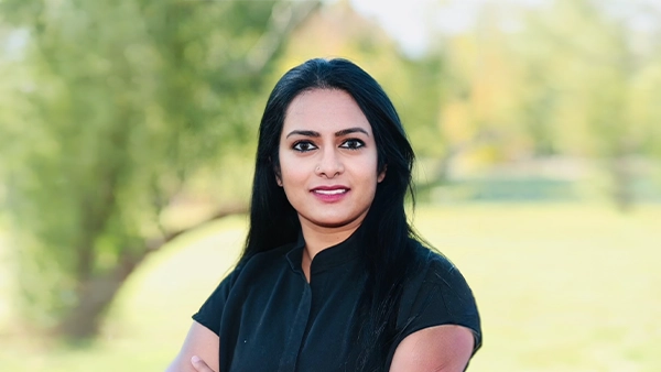 Pediatric Dentist Archana Gutta Smiling Outdoors