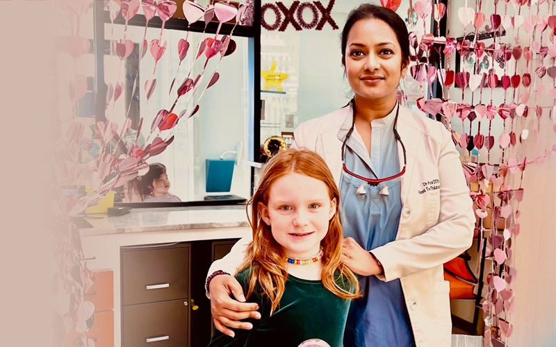 Archana Gutta With A Smiling Young Patient Alt