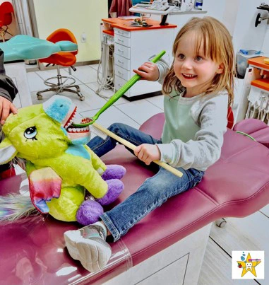 Little Girl Recciving Practicing Brushing On A Plushie